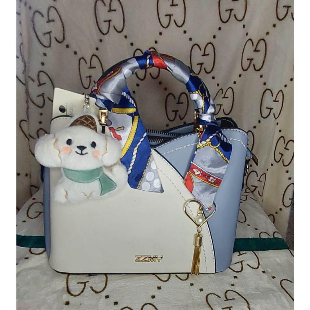 Beatiful Blue & White bag with twilly, pearl charm, and cute plush puppy charm